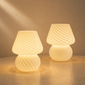 Lexion Opal glass table lamp variants on a premium warm background