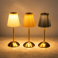 Lexion Radiant rechargeable table lamps on a clean warm premium background